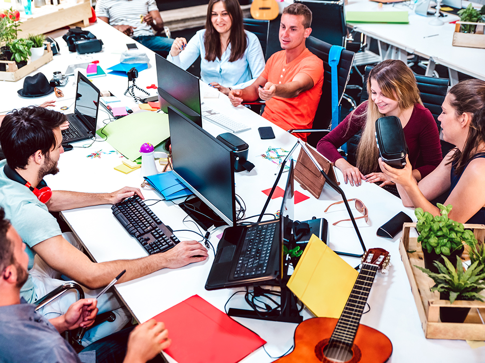 Young,People,Employee,Workers,On,Computer,At,Urban,Alternative,Studio